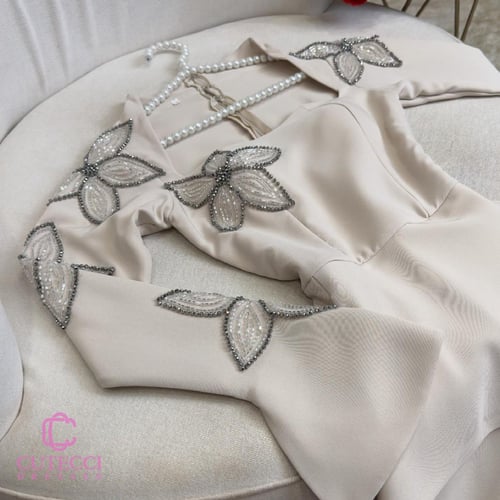 فستان سهرة جمسوت مطرز نجوم