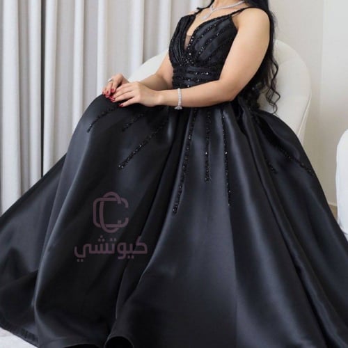 فستان سهرة أسود منفوش مطرز ترتر فاخر