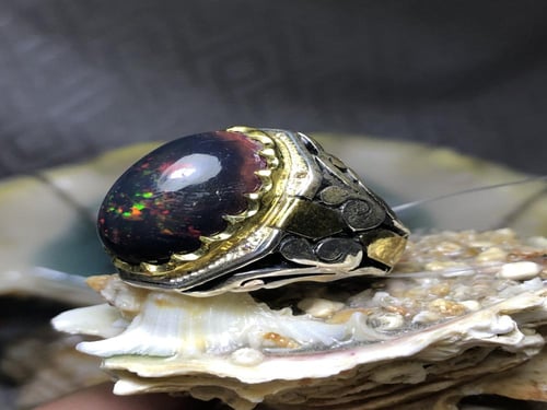 خاتم فضه بحجر الاوبال الاثيوبي مرصع بالالماس (4) ص...