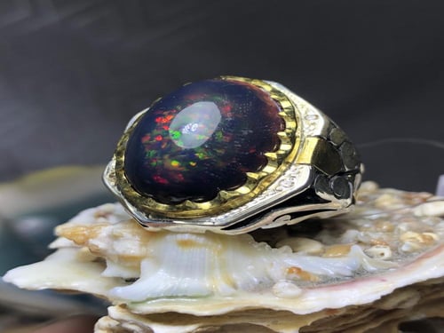 خاتم فضه بحجر الاوبال الاثيوبي مرصع بالالماس (4) ص...