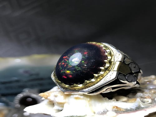 خاتم فضه بحجر الاوبال الاثيوبي مرصع بالالماس (4) ص...