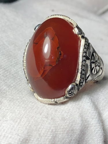 خاتم فضه بحجر العقيق اليماني المزعفر صياغه غلام