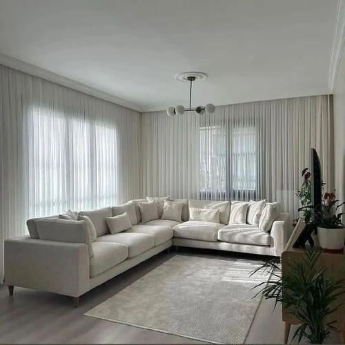 كنب زاوية حرف L بتصميم مودرن - بيج