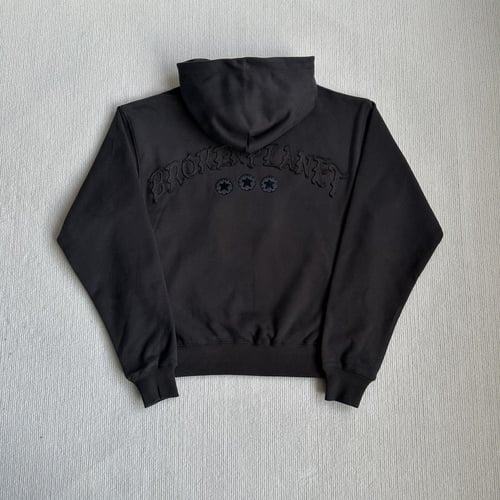 Broken planet More Darkness Hoodie