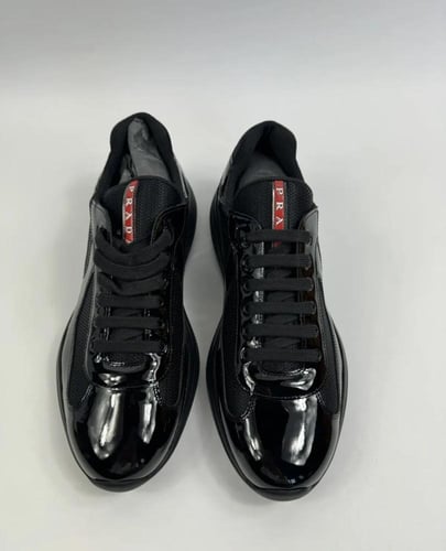 Patent leather and technical fabric Prada America'...