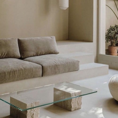 طاولة زجاج بقواعد حجر