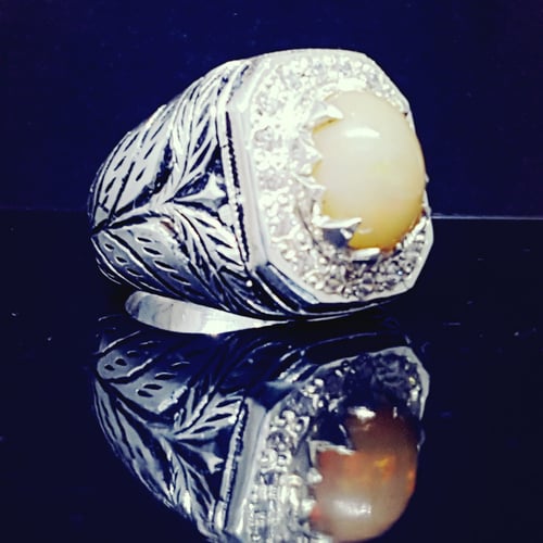 خاتم اوبال اثيوبي مرصع بالزركون