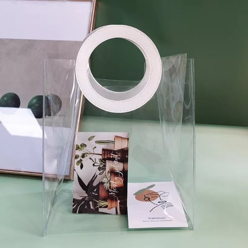 كيس شفاف بمقبض جلد