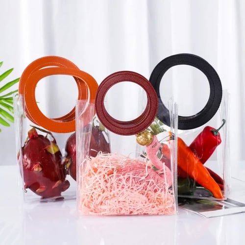 كيس شفاف بمقبض جلد