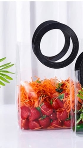 كيس شفاف بمقبض جلد