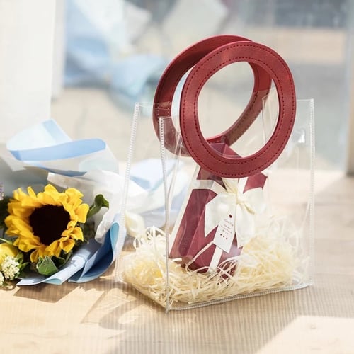 كيس شفاف بمقبض جلد