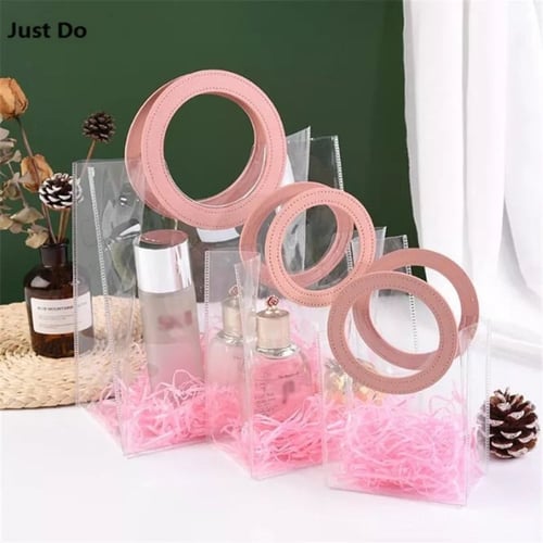 كيس شفاف بمقبض جلد