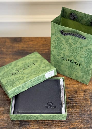 محفظة قوتشي مع الملحقات