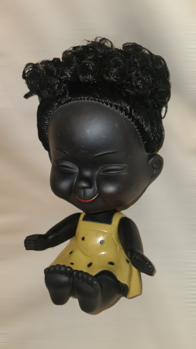 حصالة شكل(دمية)اللون:أصفرA