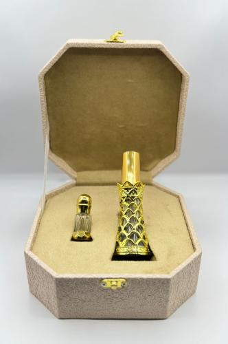 شنطه هديه تتكون من عطر + ربع توله مخلط دهن عود