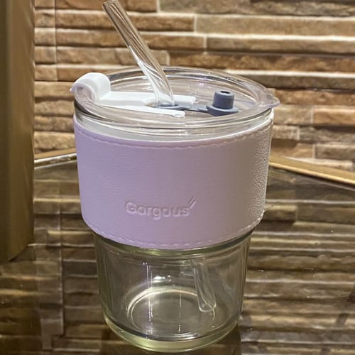 كوب زجاجي شفاف مع جلدة باللون ( الأبيض )