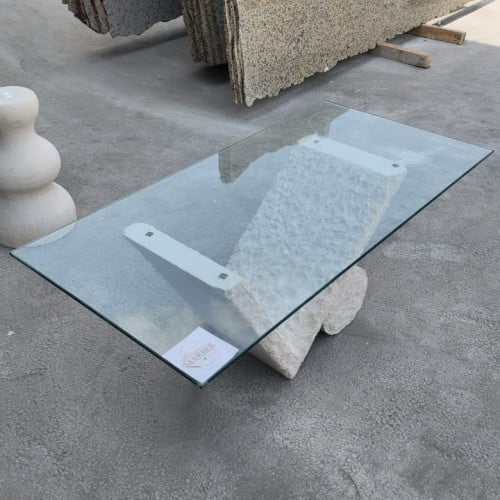 طاوله حجر بسطح زجاج