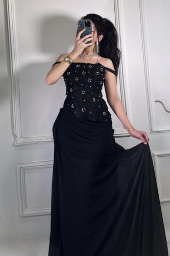 فستان نوره السحر الأسود المرصّع 131