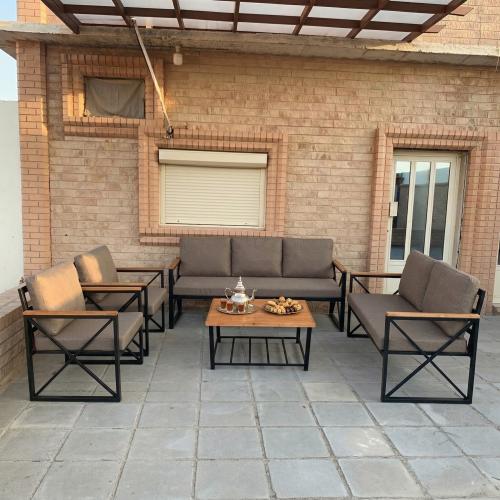 طقم جلوس خارجي حديد اسود 7 اشخاص فاخر مع طاولة سطح...