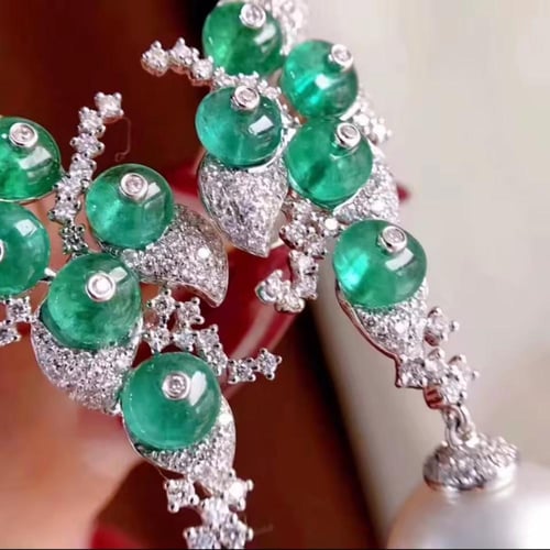 حلق فاخر من اللؤلؤ مطلي ومرصع بالألماس الصناعي