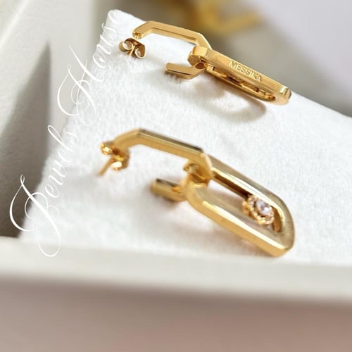 طقم مطلي من عقد وحلق مرصع بالألماس الصناعي