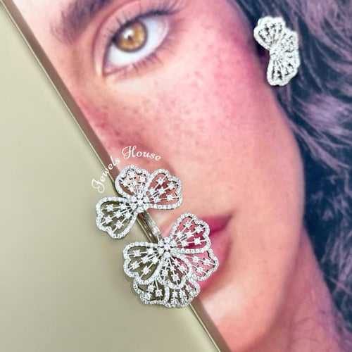 طقم من حلق وخاتم مطلي ومرصع بالألماس الصناعي