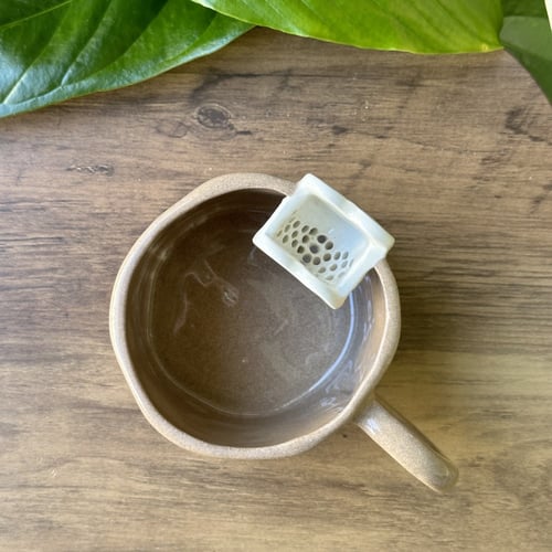 كوب الاعشاب