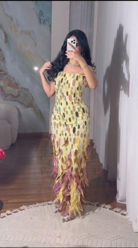 فستان سهرة مطرز بالوان