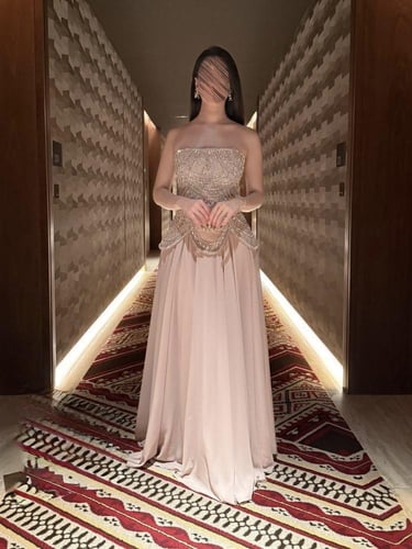 فستان سهرة بكورسية مطرزة انيق