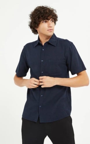 قميص لون كحلي