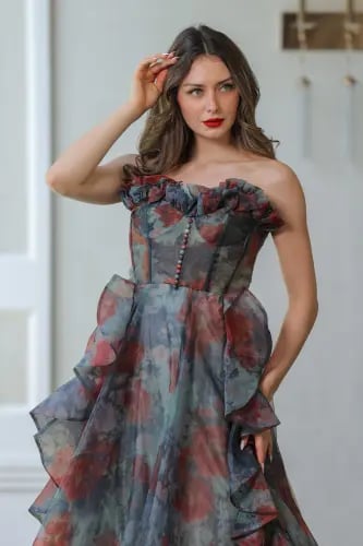 فستان سهرة بقصه كشكش بطبعات ورد