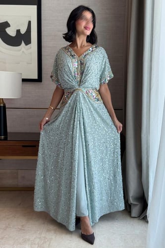 فستان مخصر مزين بالترتر لون اخضر فاتح