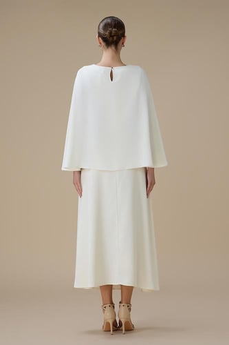 طقم سكري بتوب واسع الأكمام وتنورة ميدي بتفاصيل كري...