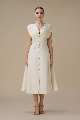 فستان ميدي سكري بأزرار أمامية وتفاصيل بليسيه