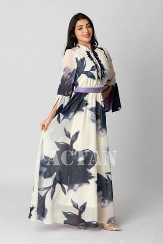 فستان طويل بطبعة أزهار مزين بهدب