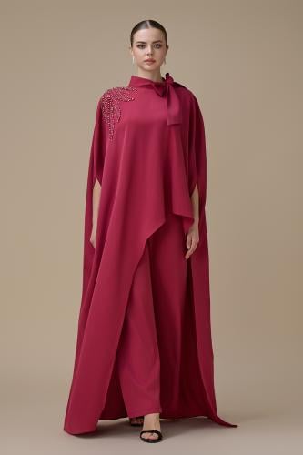 طقم جمبسوت فوشي بقصة انسيابية وتطريز كريستالي