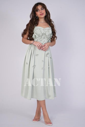 فستان ميدي بأبلكية ورد لون اخضر فاتح