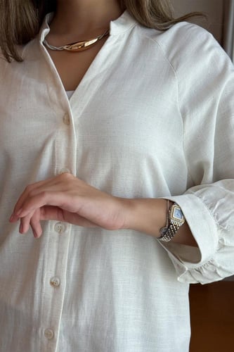 قميص باكمام واسعة لون بيج