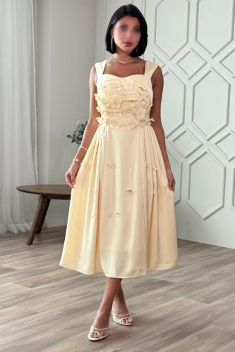 فستان ميدي بأبلكية ورد لون أصفر فاتح