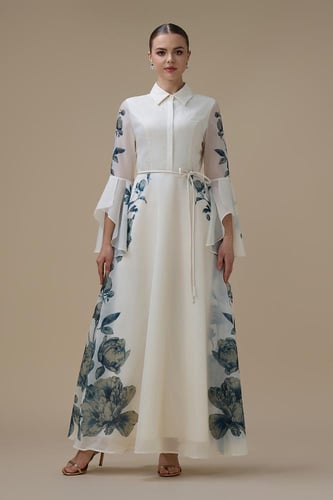 فستان طويل أبيض بقصة قميص ونقشة زهرية جانبية