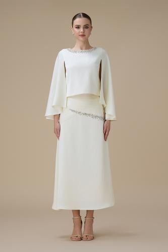 طقم سكري بتوب واسع الأكمام وتنورة ميدي بتفاصيل كري...