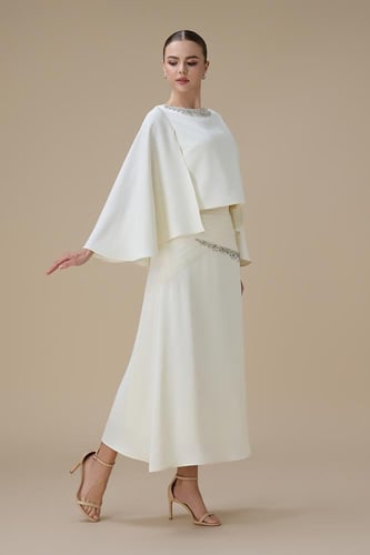 طقم سكري بتوب واسع الأكمام وتنورة ميدي بتفاصيل كري...