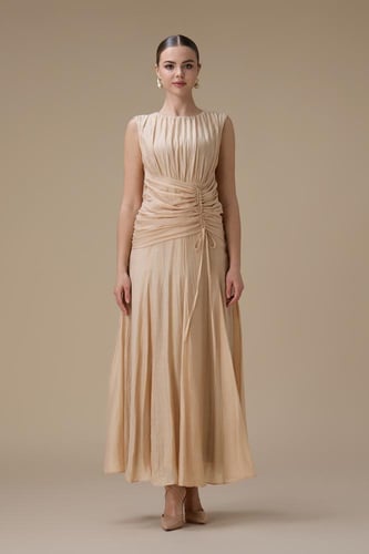 فستان طويل بيج مع كسرات جانبية