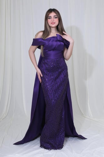 فستان سهرة ملكي بدون أكمام مزين بفيونكة وتطريز فاخ...