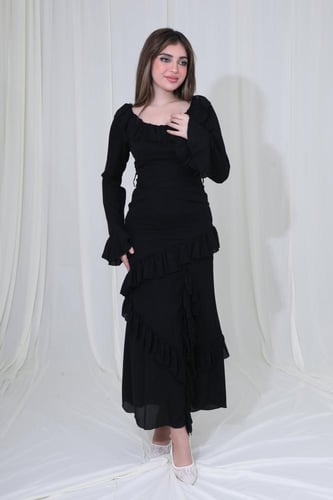 فستان طويل بكسرات وكشكشة ناعمة لإطلالة أنثوية جذاب...