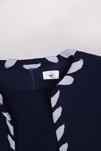 طقم كحلي فستان بزم سفلي بدون أكمام مع جاكيت قصير ب...