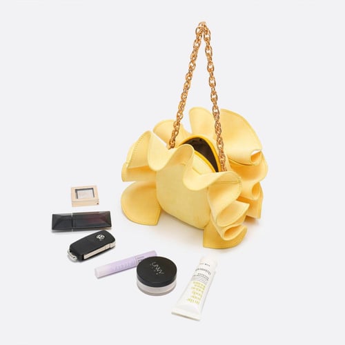 حقيبة بكشكشة أصفر