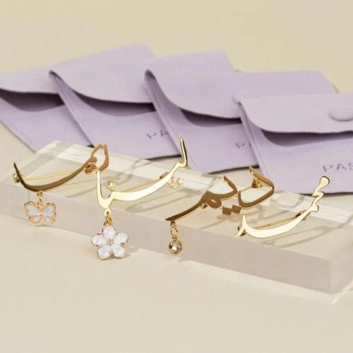 مشبك - بروش بالأسم