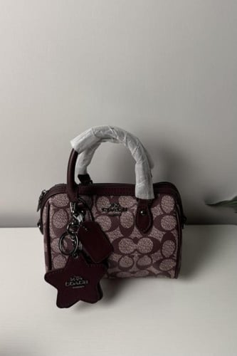 شنطة كوتش mini rowan بني غامق