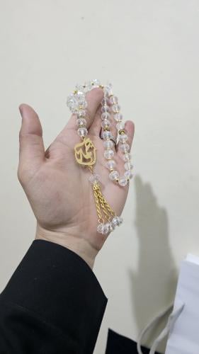 سبحه زجاجي مع اسم مطلي بالذهب